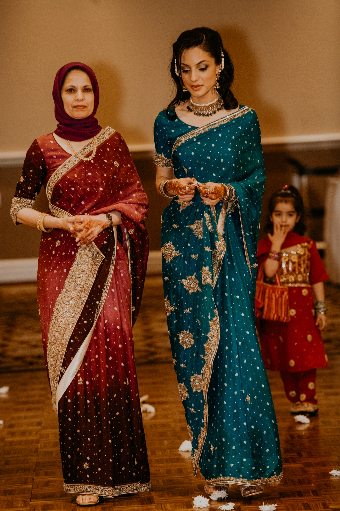 Mother and sister of bride at Mehndi wedding 