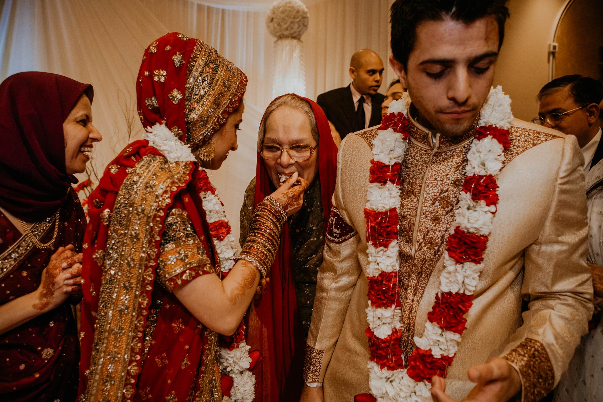 Documentary photo of bride groom and guest at Mehndi Indian wedding