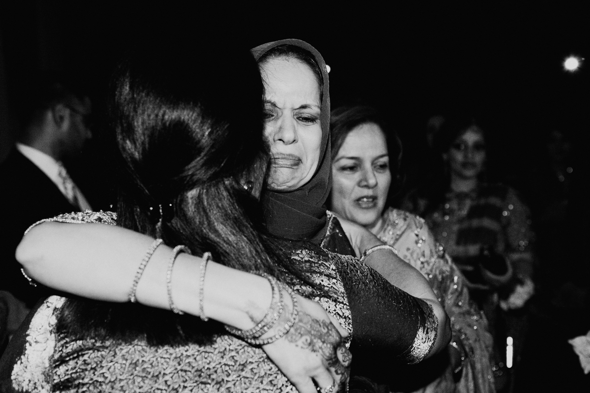Mother of bride cries with women at Islamic Muslim Nikah ceremony documentary photo Minnapolis