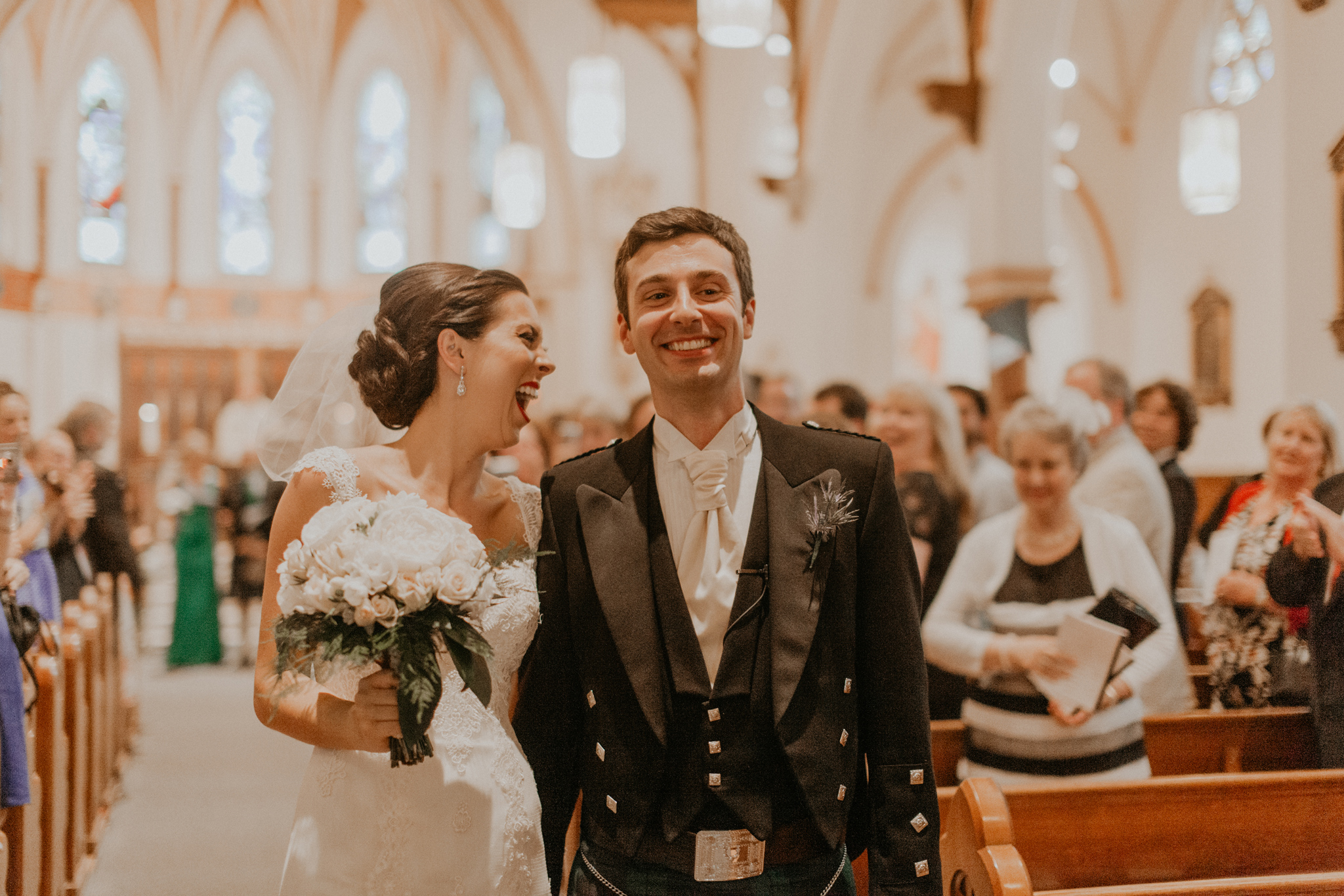 Bride and groom recessional in Scottish church wedding