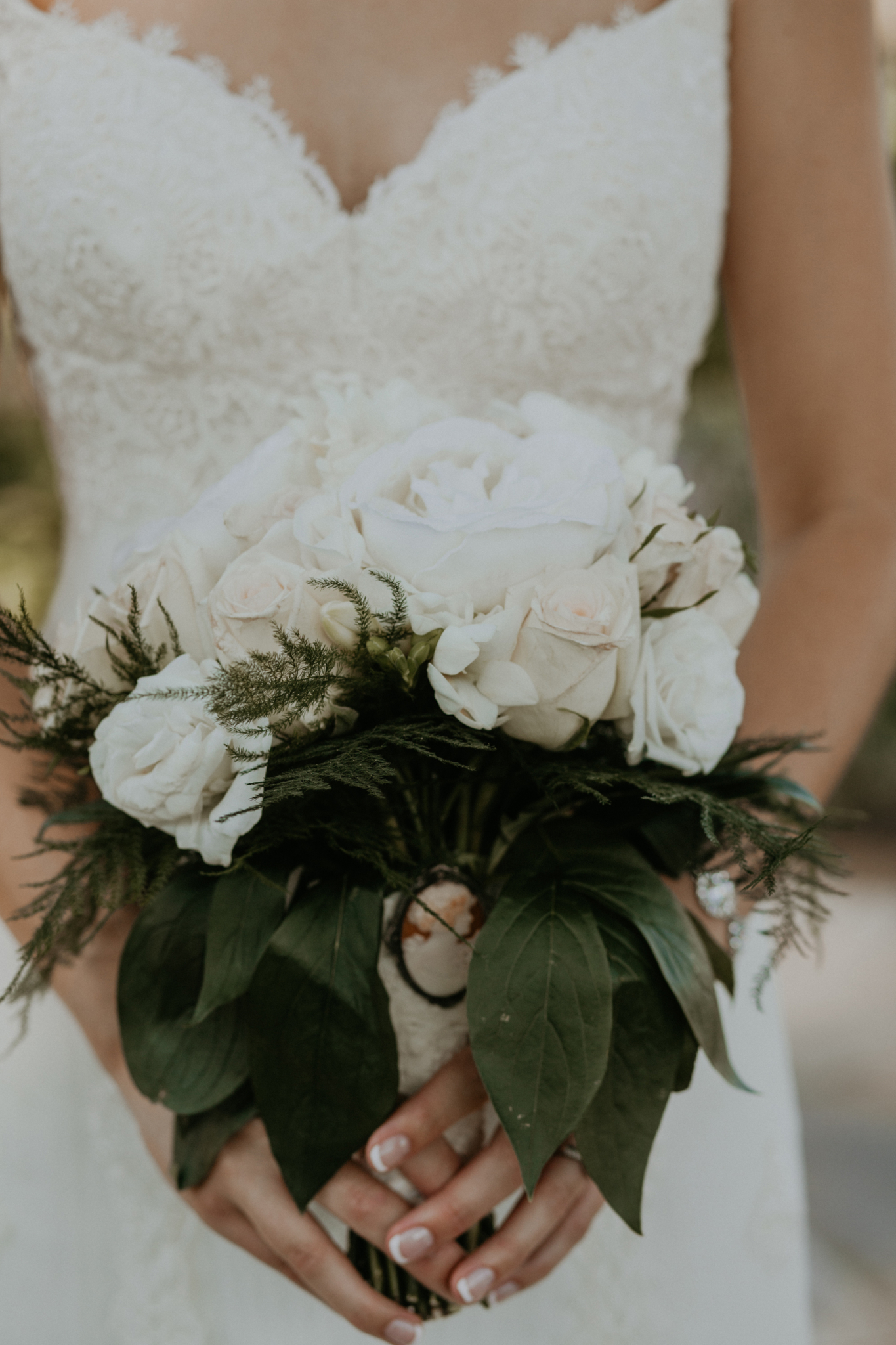 Close up portrait of bride holding bouquet