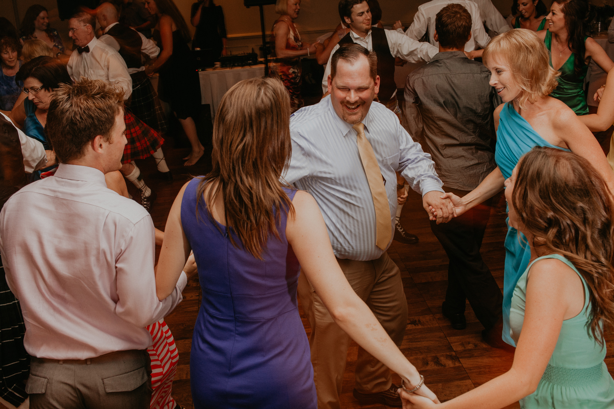 Guests dance at wedding during recpetion