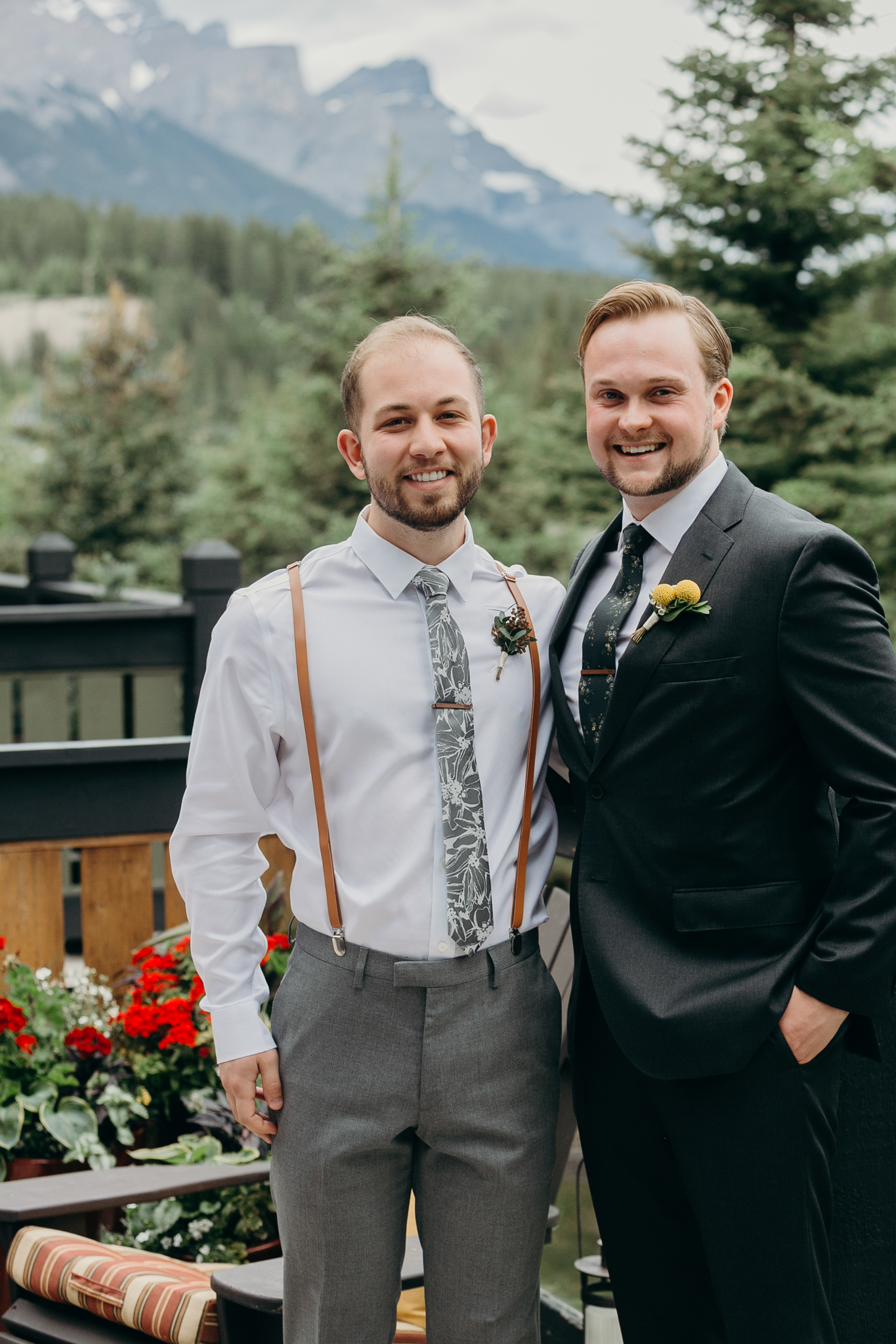 Groom and groomsman portrait smiling destination wedding photographer Canmore Banff