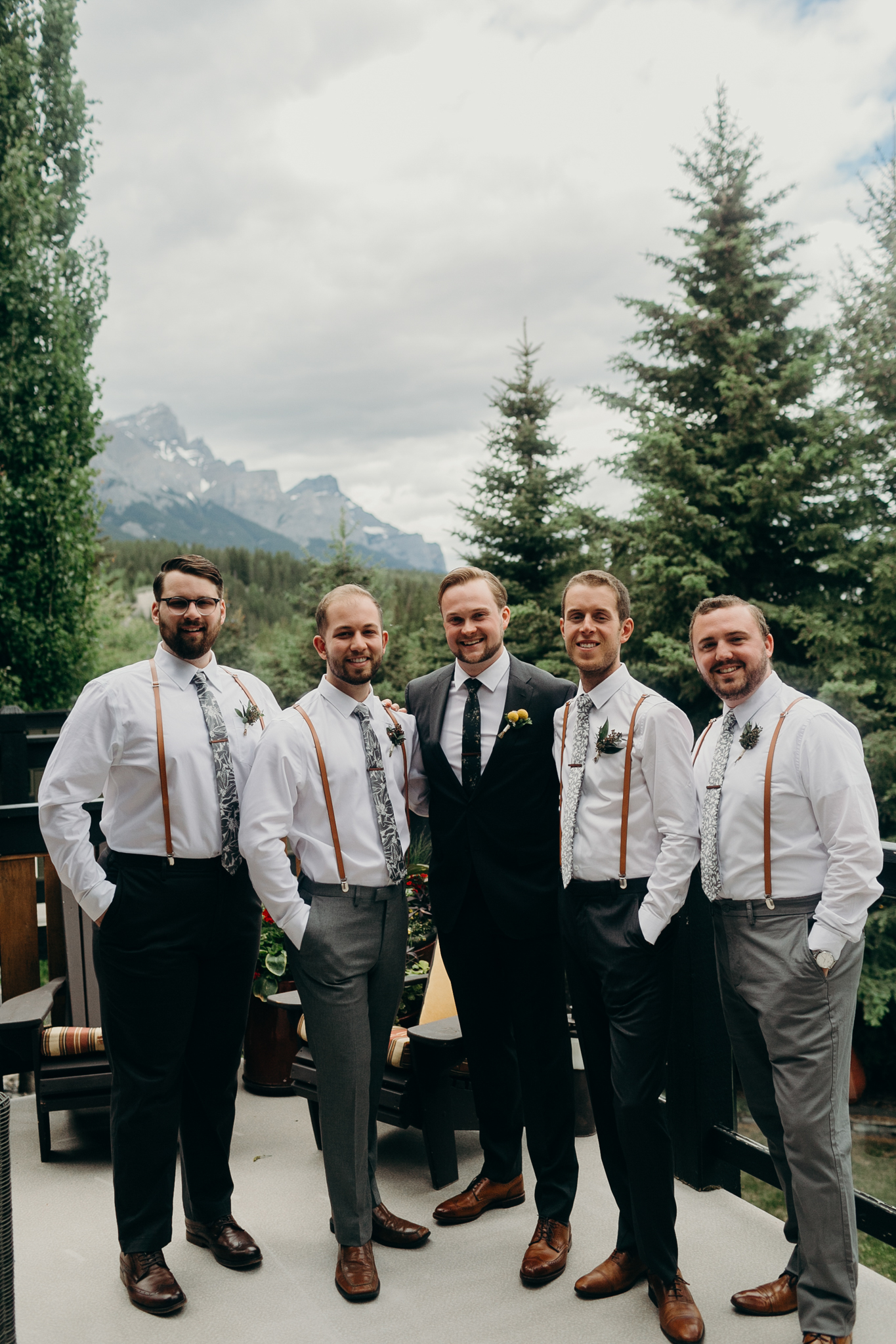 Groom and groomsmen portrait smiling destination wedding photographer Canmore Banff